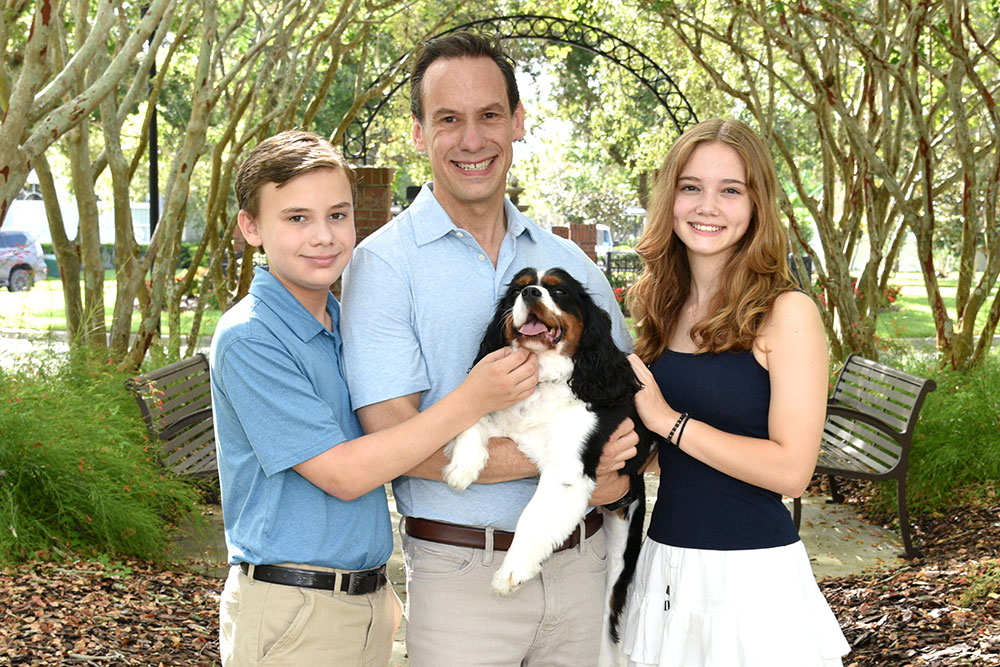 Jim with his kids and dog, Scout